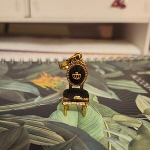 Elegant Black and Gold Chair Charm